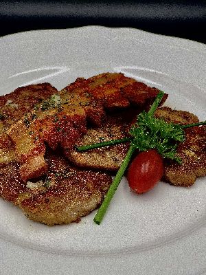 Cigánypecsenye (Roasted pork chop with garlic)